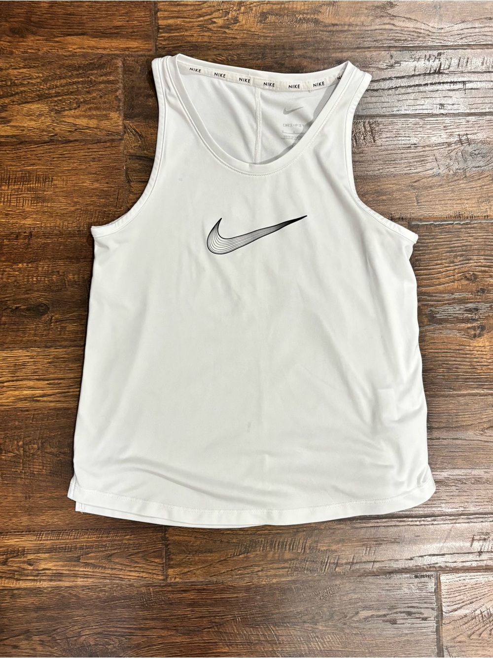 Girls Nike White Sleeveless Athletic Tank with Black Swoosh